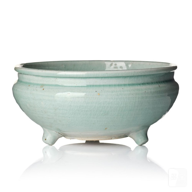 A pale celadon glazed tripod censer,